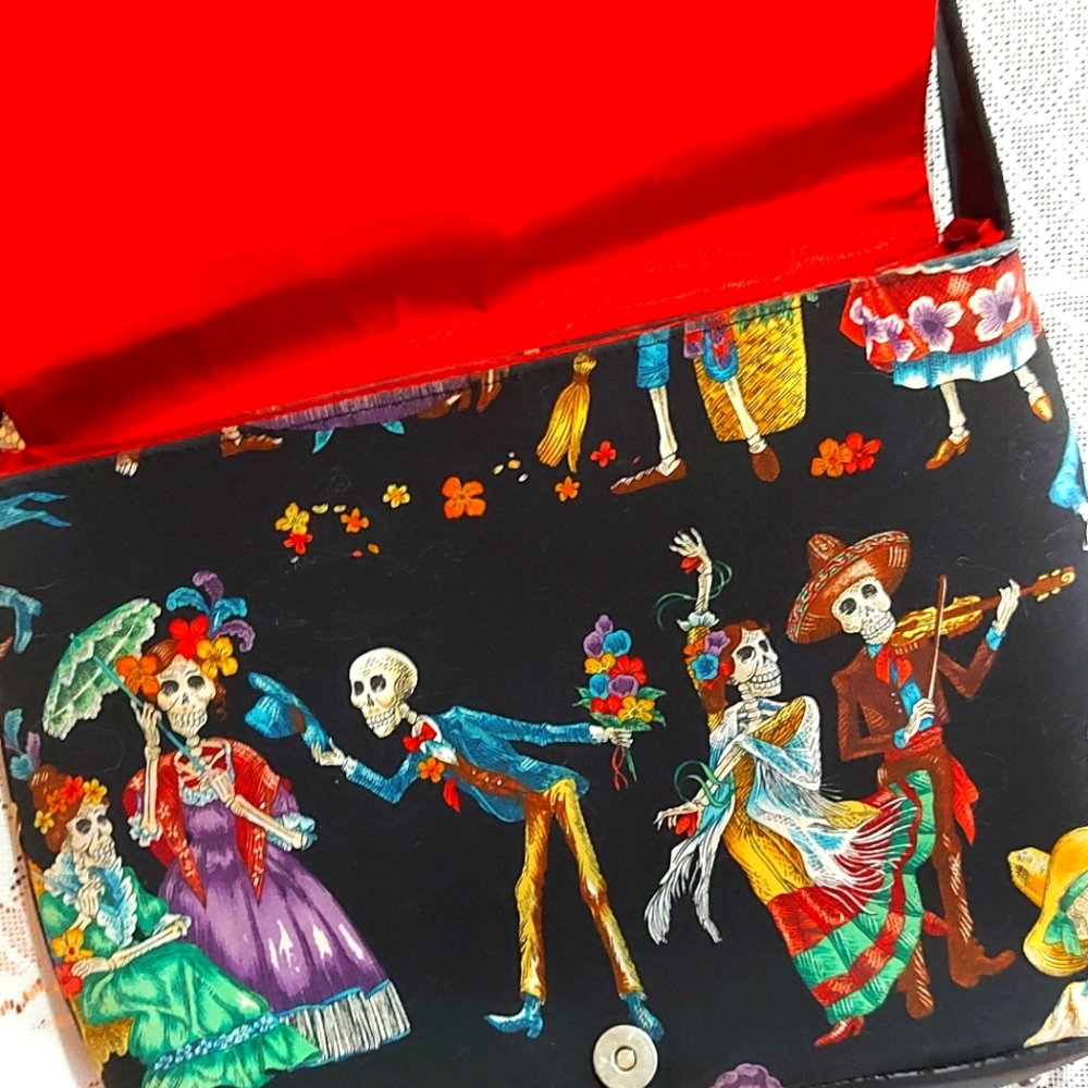 Day of the dead skulls dancing black purse